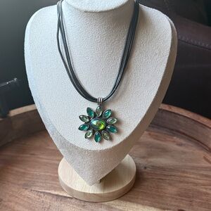 Green Crystal Flower Pendant Necklace on Multi-Strand Black Cord